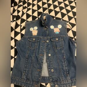 Denim& Co Jean jacket turned vest with fun patches. Size 6. Perfect for spring